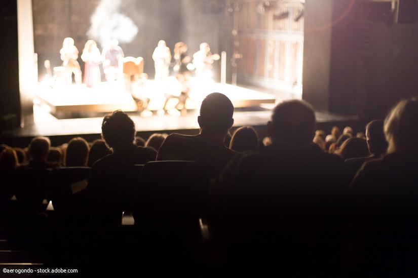 theater audience watching the play